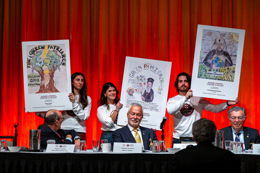 Winning artwork is debuted during the Annual Archon Meeting from the inaugural Ecumenical Patriarch Poster Contest. Nine young artists received first-, second-, and third-place honors across the elementary, middle, and high school divisions. (Photo by J. Mindala)