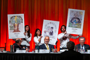 Winning artwork is debuted during the Annual Archon Meeting from the inaugural Ecumenical Patriarch Poster Contest. Nine young artists received first-, second-, and third-place honors across the elementary, middle, and high school divisions. (Photo by J. Mindala)